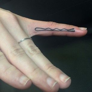 bobby pin tattoo on the finger