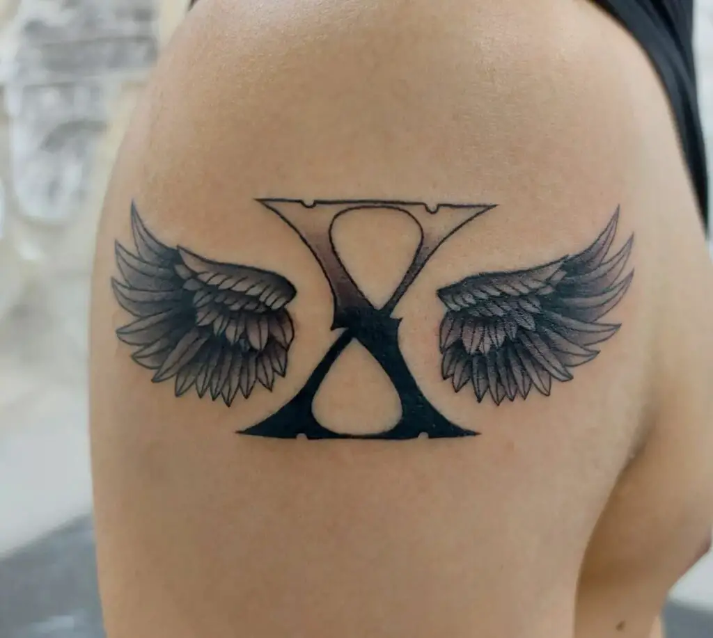 X tattoo