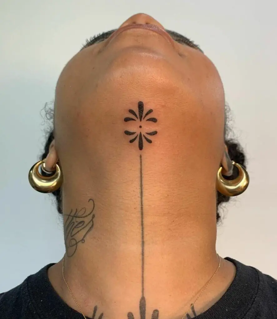 Under chin tattoo