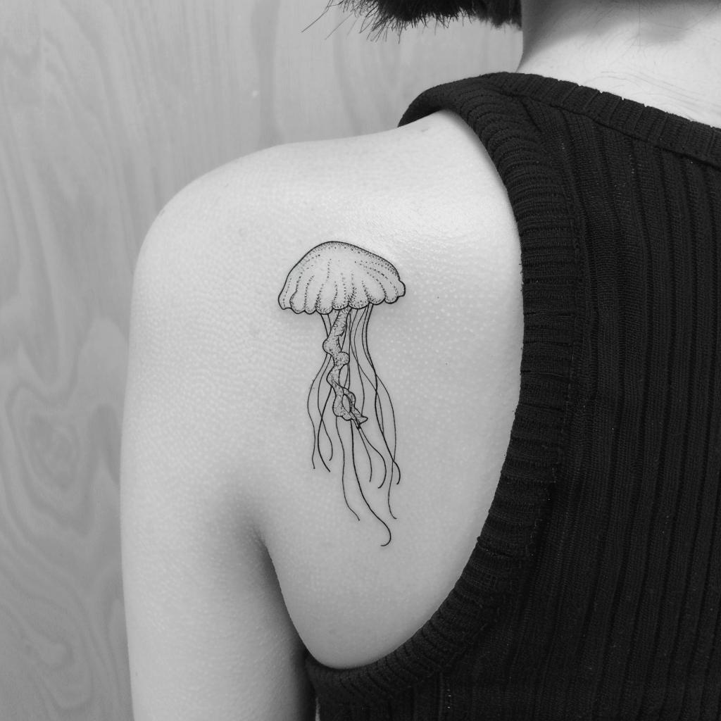 connectakader minimalistic small line art jellyfish tattoo on 2f0a9245 ae61 4bc6 9255 085d0c29adae 3